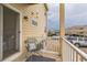Cozy patio with outdoor seating, offering a relaxing space with views of the parking area at 1771 W 53Rd Pl # 2, Denver, CO 80221