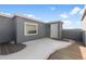 An outdoor deck features gray wood flooring, a white door, and a large window with snow at 14261 Currant St, Broomfield, CO 80020