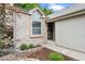 Inviting entryway with brick accents and professional landscaping; a warm welcome to a beautiful home at 17692 E Brunswick Pl, Aurora, CO 80013