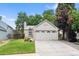 Charming home with a well-manicured front lawn and an attached two-car garage in a quiet neighborhood at 17692 E Brunswick Pl, Aurora, CO 80013