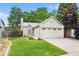 Charming home with a well-manicured front lawn and an attached two-car garage in a quiet neighborhood at 17692 E Brunswick Pl, Aurora, CO 80013