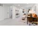 Open-concept living area with cozy seating, contemporary furnishings, and ample natural light at 949 Pontiac St, Denver, CO 80220