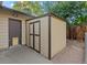 Exterior view of shed in backyard featuring side door entry to main house at 7310 Granada Rd, Denver, CO 80221