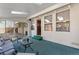 Bright sunroom featuring skylights, windows, and access to an outdoor living space at 7310 Granada Rd, Denver, CO 80221