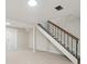 Finished basement with black iron railing at 12927 W 20Th Ave, Golden, CO 80401