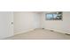 Bedroom featuring plush carpet, window, and closet at 12927 W 20Th Ave, Golden, CO 80401