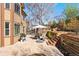 Landscaped backyard features terraced gardens, seating, and a patio area for relaxation at 12710 W 84Th Cir, Arvada, CO 80005