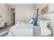 Relaxing bedroom with a king-size bed and soft textiles at 6521 S Harlan Ct, Littleton, CO 80123