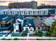 Aerial view of updated craftsman home amongst new construction homes at 3443 Lawrence St, Denver, CO 80205