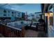 Relaxing deck features a sectional sofa and outdoor dining area at 3443 Lawrence St, Denver, CO 80205