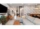 Open living space showcasing a spiral staircase and modern kitchen at 3443 Lawrence St, Denver, CO 80205