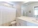 Bathroom with shower/tub combo, toilet, sink, vanity, and neutral colors, creating a calming atmosphere at 5156 Bittercress Rd, Brighton, CO 80640