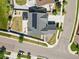 Aerial view of a home with solar panels, well-kept landscaping, and an entertainment area at 14920 Munich Ave, Parker, CO 80134