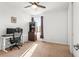 Spacious bedroom with a ceiling fan, a window, and plush carpeting at 14920 Munich Ave, Parker, CO 80134