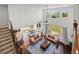 Overhead view of a spacious living room with wood floors, tall ceilings, and large windows at 14920 Munich Ave, Parker, CO 80134