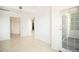 Open space with tiled flooring and a sliding glass door at 300 W 11Th Ave # 6G, Denver, CO 80204