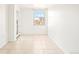 Empty bedroom with a window view and tiled flooring at 300 W 11Th Ave # 6G, Denver, CO 80204