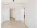 Open space with tiled flooring and open doorways at 300 W 11Th Ave # 6G, Denver, CO 80204