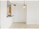 Kitchen area with bar seating, granite countertops, and stainless steel sink at 300 W 11Th Ave # 6G, Denver, CO 80204