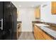 Modern kitchen featuring sleek cabinets, granite countertops, stainless steel appliances, and ample storage space at 300 W 11Th Ave # 6G, Denver, CO 80204
