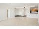 Inviting living room showcasing an open layout and modern lighting fixtures, complemented by hardwood and tile flooring at 300 W 11Th Ave # 6G, Denver, CO 80204