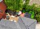 Aerial view showcases a backyard with an outdoor fireplace, hot tub, dining, and seating areas, perfect for entertainment and relaxation at 2153 S Columbine St, Denver, CO 80210