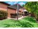 Inviting backyard with a hot tub, lush lawn, and privacy, creating a perfect outdoor retreat for relaxation and recreation at 2153 S Columbine St, Denver, CO 80210