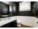 Chic bathroom features elegant fixtures, a marble vanity, and contemporary design elements for a luxurious feel at 2153 S Columbine St, Denver, CO 80210