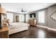 Serene bedroom with hardwood floors, large windows, and neutral tones, creating a relaxing retreat at 2153 S Columbine St, Denver, CO 80210