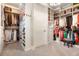 Large walk-in closet with custom shelving, hanging rods, and ample storage space at 2153 S Columbine St, Denver, CO 80210