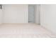 Spacious basement area with neutral carpet and white walls, ready for customization and comfortable living space at 1475 S Urban Way, Lakewood, CO 80228