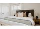 Comfortable bedroom featuring a well-made bed with soft pillows and a stylish throw blanket at 1475 S Urban Way, Lakewood, CO 80228