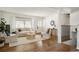 Inviting living room with hardwood floors, natural light, and stylish furnishings at 1475 S Urban Way, Lakewood, CO 80228