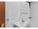 Small bathroom with sink, mirror, and simple fixtures at 1275 Otis St, Lakewood, CO 80214