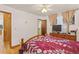 The main bedroom features wood floors, and a double window for natural light at 1275 Otis St, Lakewood, CO 80214