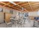 Enclosed sunroom with dining sets and many windows at 1275 Otis St, Lakewood, CO 80214