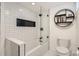 Well-designed bathroom featuring herringbone tile and stylish shelving for a modern look at 1749 S Lincoln St, Denver, CO 80210