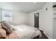 Relaxing bedroom with natural light, creating a calm and welcoming retreat at 1749 S Lincoln St, Denver, CO 80210