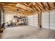 Spacious garage with workout equipment and ample room for vehicles and storage at 1749 S Lincoln St, Denver, CO 80210