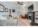 Comfortable living room boasts a fireplace and hardwood floors at 1749 S Lincoln St, Denver, CO 80210
