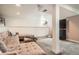Bright living room with an inviting sectional sofa and comfortable decor at 1749 S Lincoln St, Denver, CO 80210