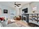 Bright and inviting living room featuring a fireplace and hardwood floors at 1749 S Lincoln St, Denver, CO 80210