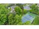 Overhead view of the property with a tennis court and landscaped grounds at 7330 Routt St, Arvada, CO 80005