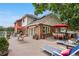 Spacious back deck with ample seating provides a beautiful outdoor relaxation and entertainment area at 7330 Routt St, Arvada, CO 80005