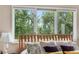 Bedroom window view of the backyard bringing natural light into the room at 7330 Routt St, Arvada, CO 80005