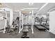 Home gym with professional equipment and rubber flooring at 7330 Routt St, Arvada, CO 80005