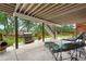 Outdoor patio featuring a grill, lounge chairs, and fireplace, perfect for entertaining guests at 7330 Routt St, Arvada, CO 80005
