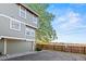 Townhome with attached garage and manicured green exterior, situated on a landscaped lot at 1907 S Helena St # G, Aurora, CO 80013