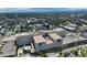 Aerial view of a city neighborhood with a hospital complex and cityscape in the background at 1735 N Ogden St # 303, Denver, CO 80218