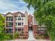 Attractive brick building with landscaping and steps at 1735 N Ogden St # 303, Denver, CO 80218